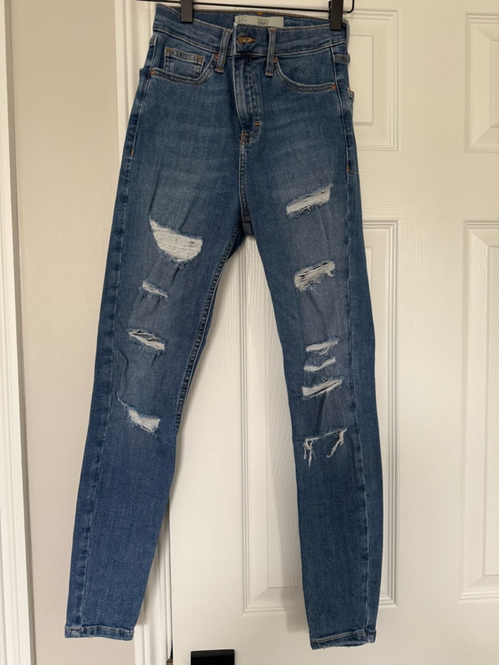 Topshop Distressed Skinny Jeans in Blue